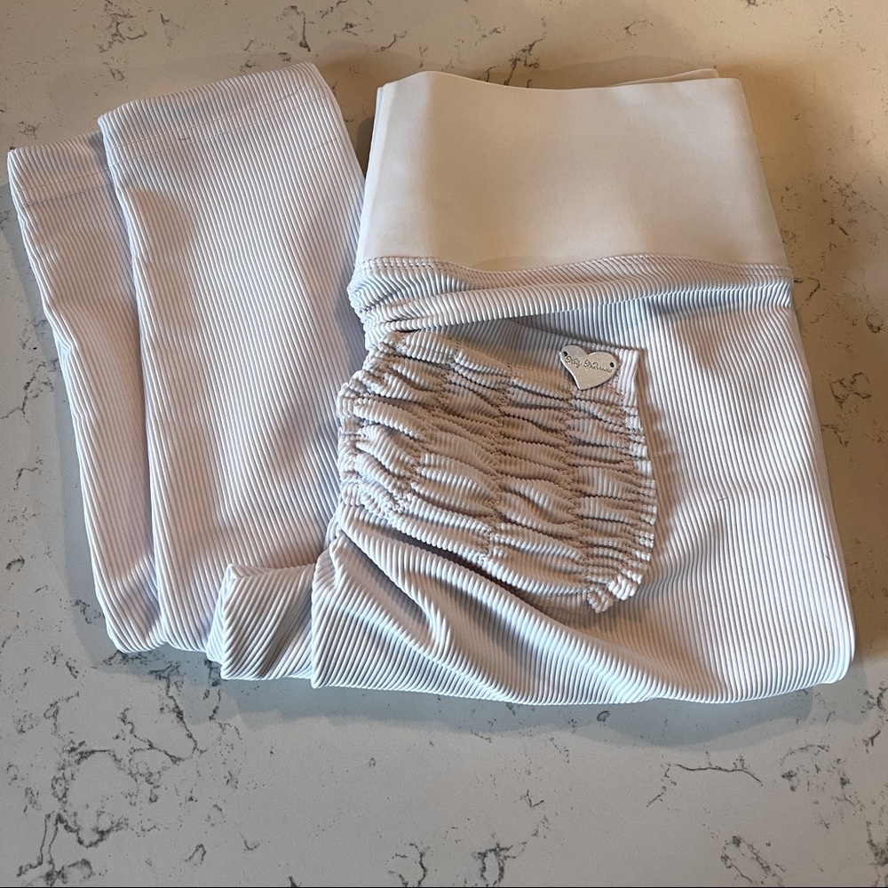 Cute Booty Lounge white leggings.